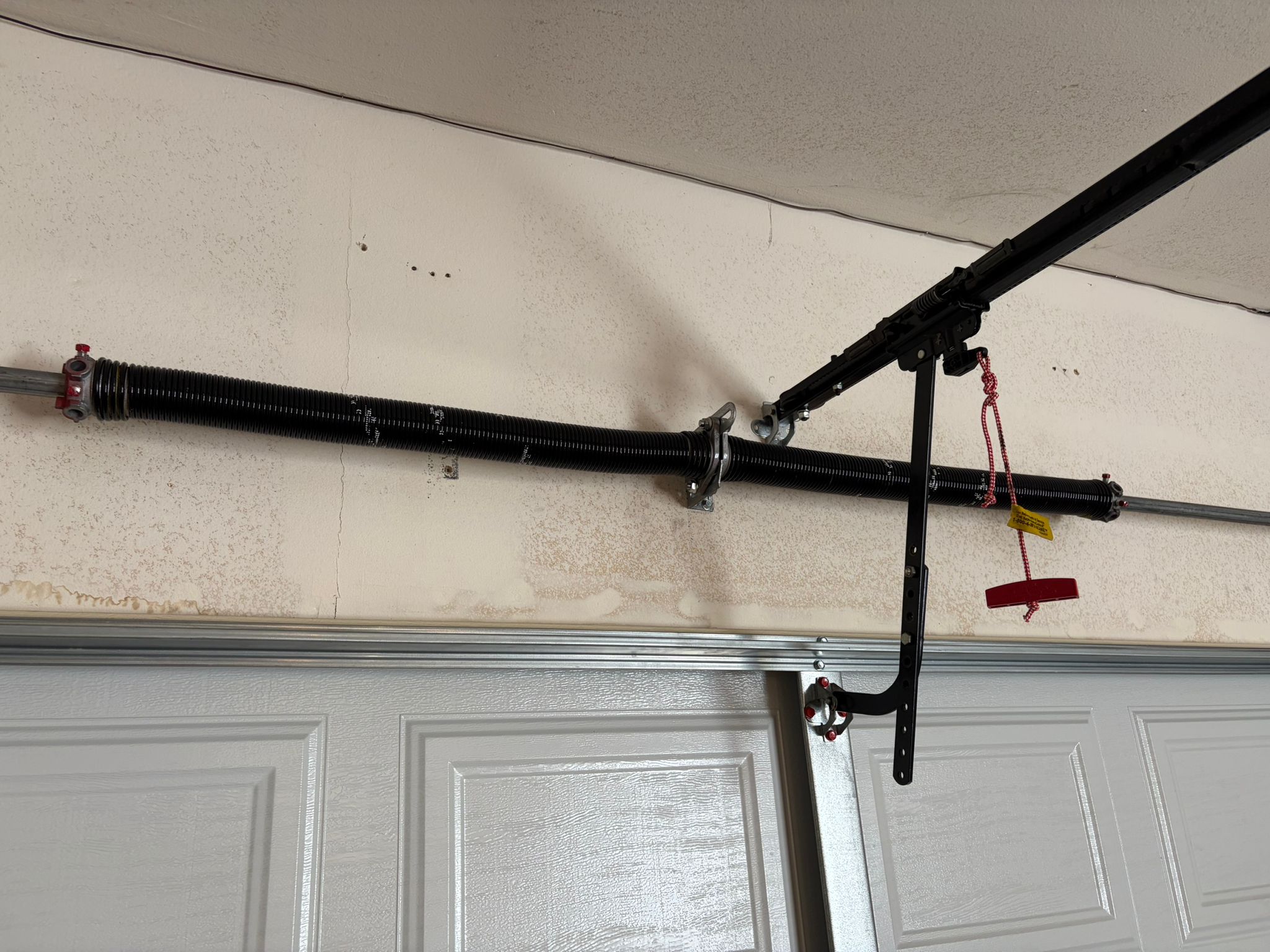 New garage door spring installed