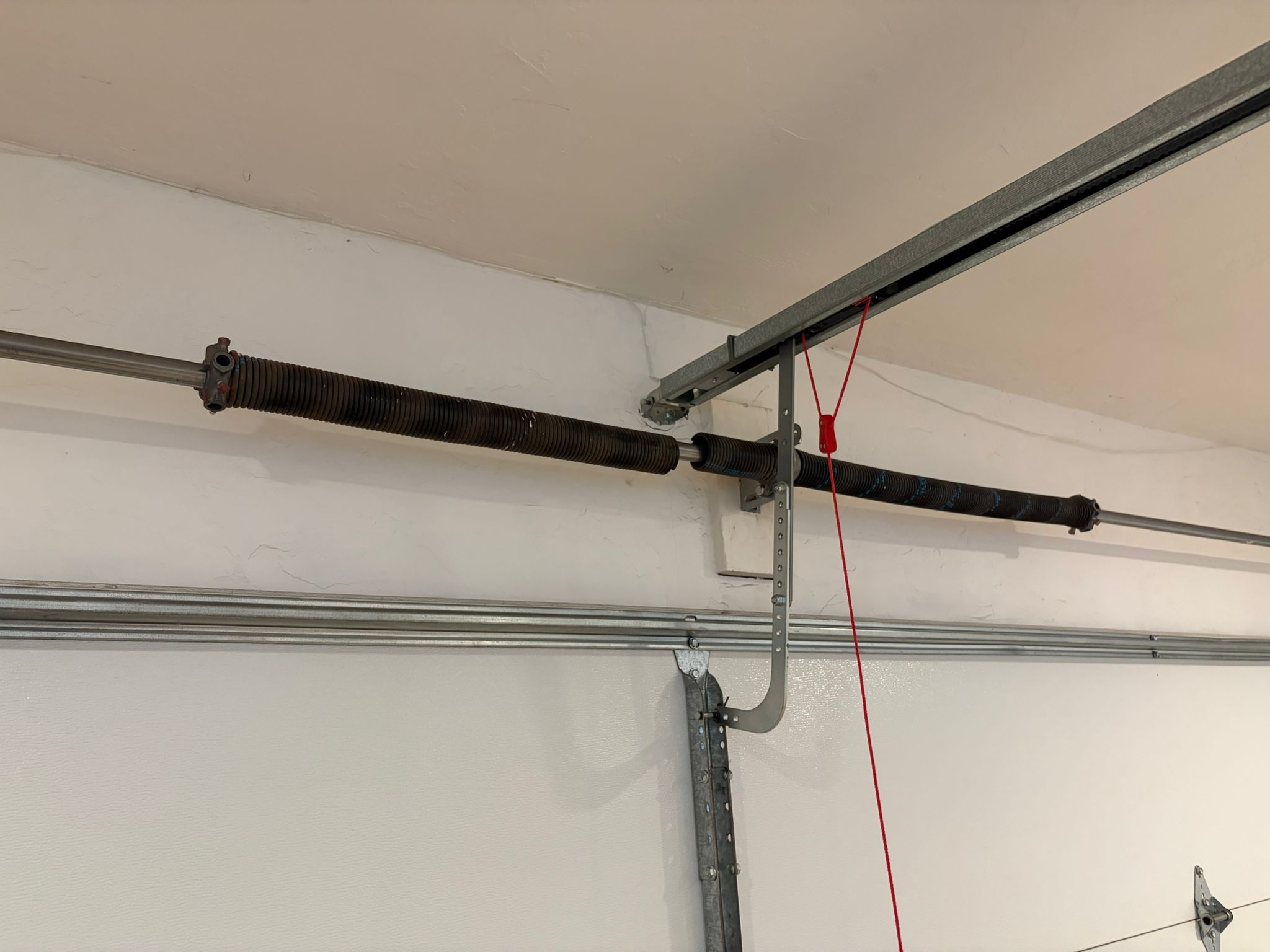 Old worn garage door springs