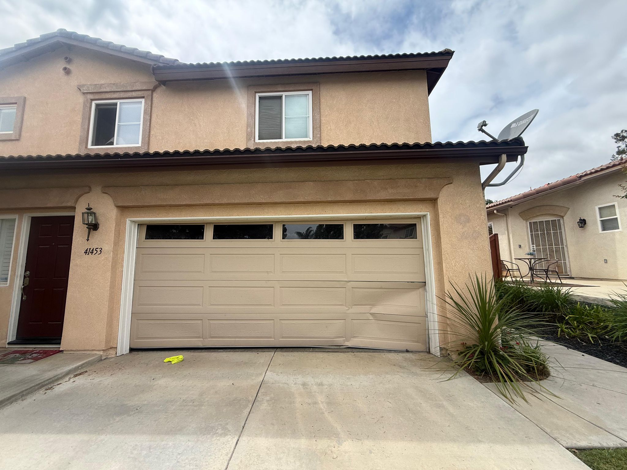 Old garage door before replacement San Diego